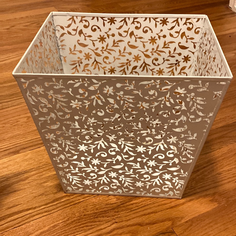 white decorative trash bin
